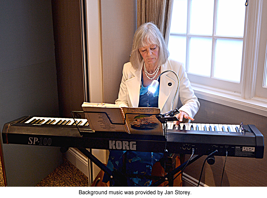 Jan Storey providing background music on keyboards